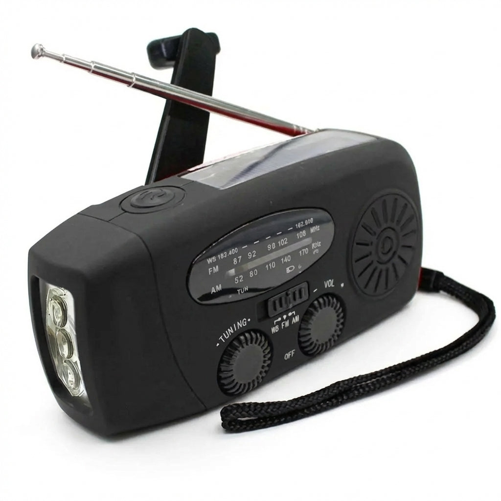 Schwarzes Notfallradio mit analogem Tuner, Lautsprecher, Bandwahlschalter und Drehreglern an der Vorderseite